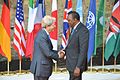 G7 Taormina Paolo Gentiloni Uhuru Kenyatta handshake 2017-05-27.jpg