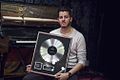 Alex Moreno platinum record.jpg