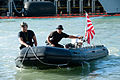 EOD divers from JS Bungo move a boat during RIMPAC 2012, -10 Jul. 2012 a.jpg