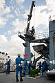 Sailors on JS Bungo load dummy mines into the hold during RIMPAC 2012, -10 Jul. 2012 b.jpg